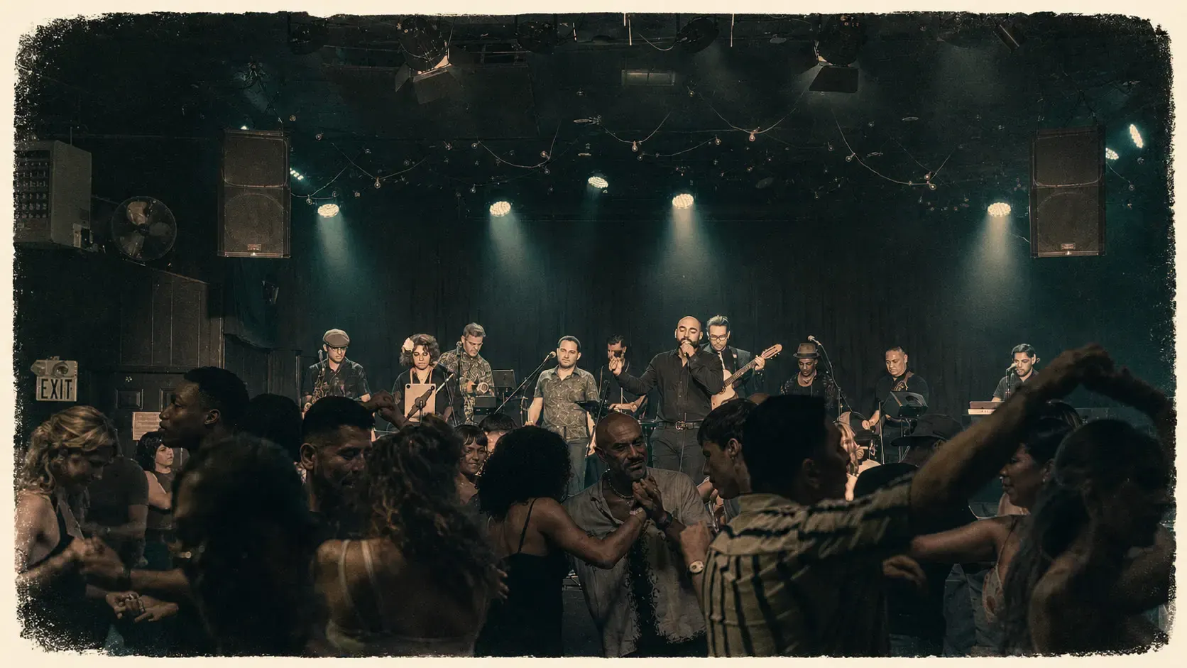 Guajirón performing for a dancing audience at La Peña